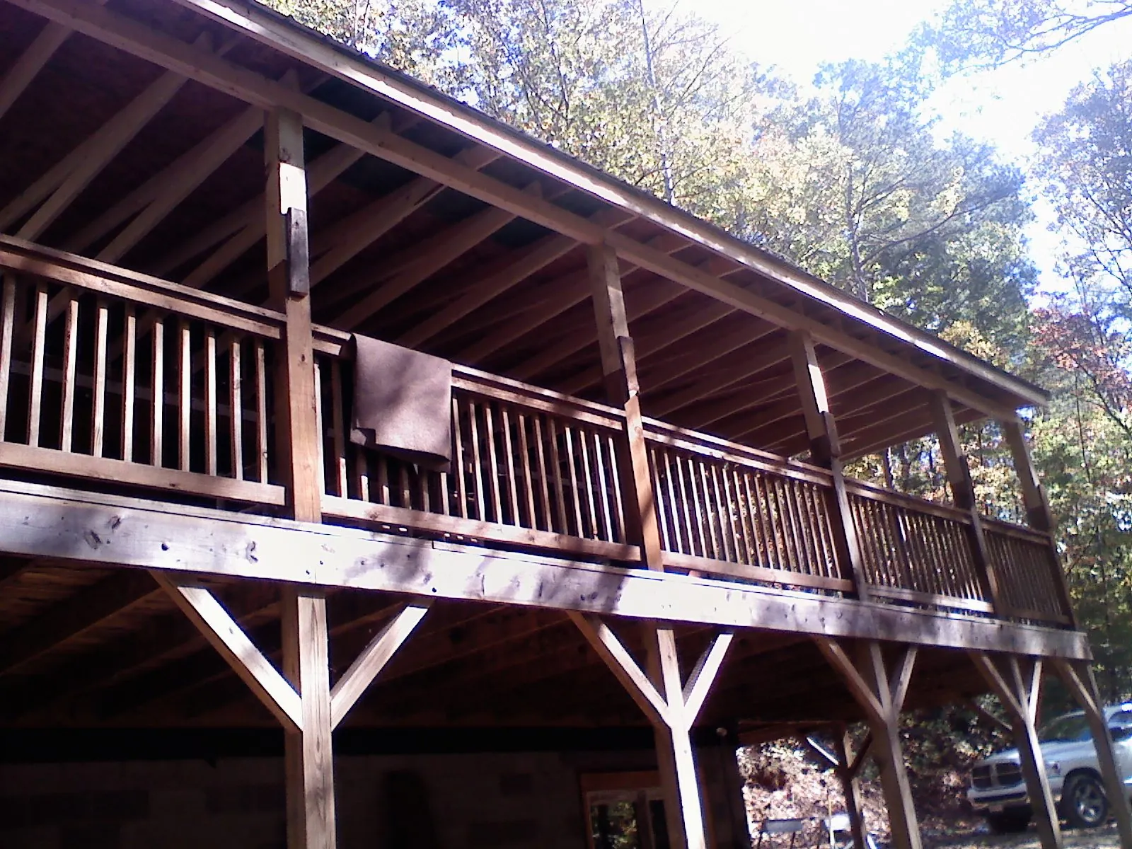 Timber framing under a new elevated porch and deck — Roof Leak Repair in Rural Hall by Roofing Brothers